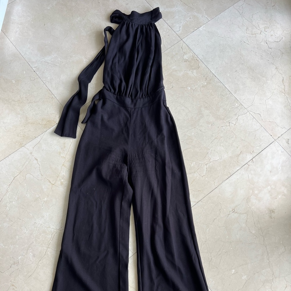 Black wide leg. Open back. Halter black jumpsuit.